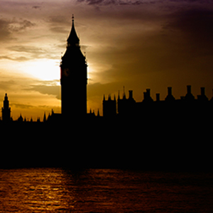 Silhouette of London skyline at sunset.